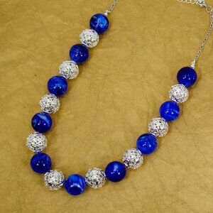 Blue and silver bead fashion necklace with large round blue marble look beads